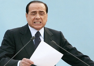 Berlusconi fait des grimaces